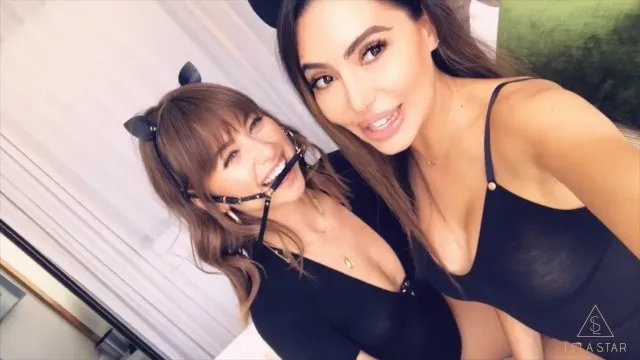 Sexy brunette shares massive cock with teen in anal threesome